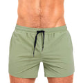 Mesh lining polyester sports shorts in solid colours for swimming and fitness.