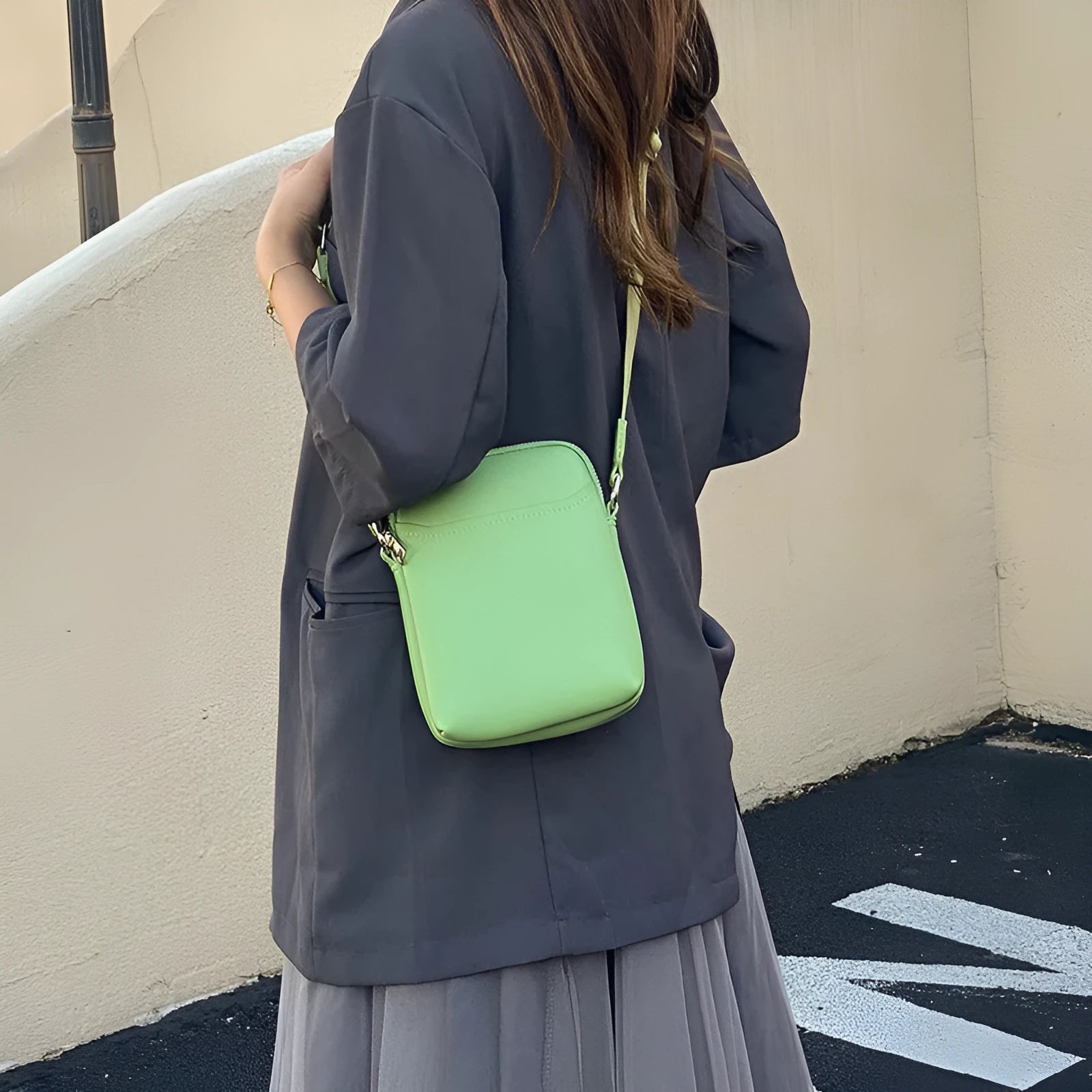 Small solid colour mobile phone crossbody bag in PU leather measuring 14.5cm wide