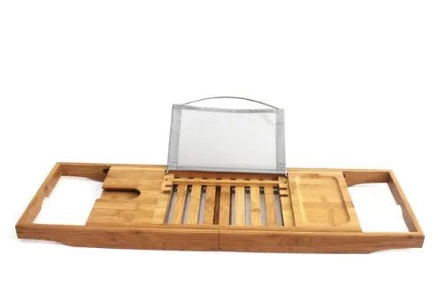 Natural bamboo bathtub caddy tray with one shelf resting on a bath edge.