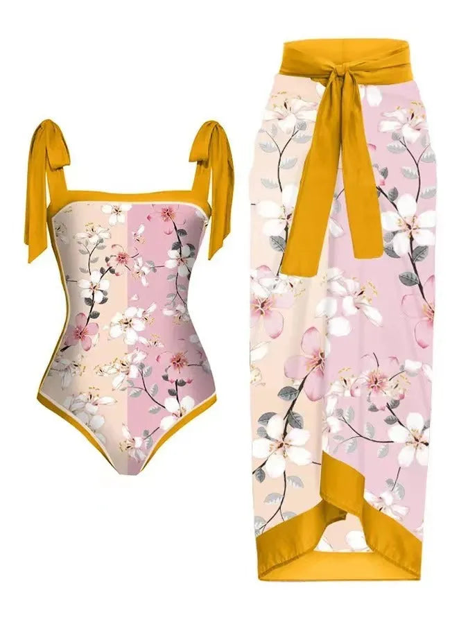 Women's printed floral two-piece swimsuit with a matching chiffon hip skirt.