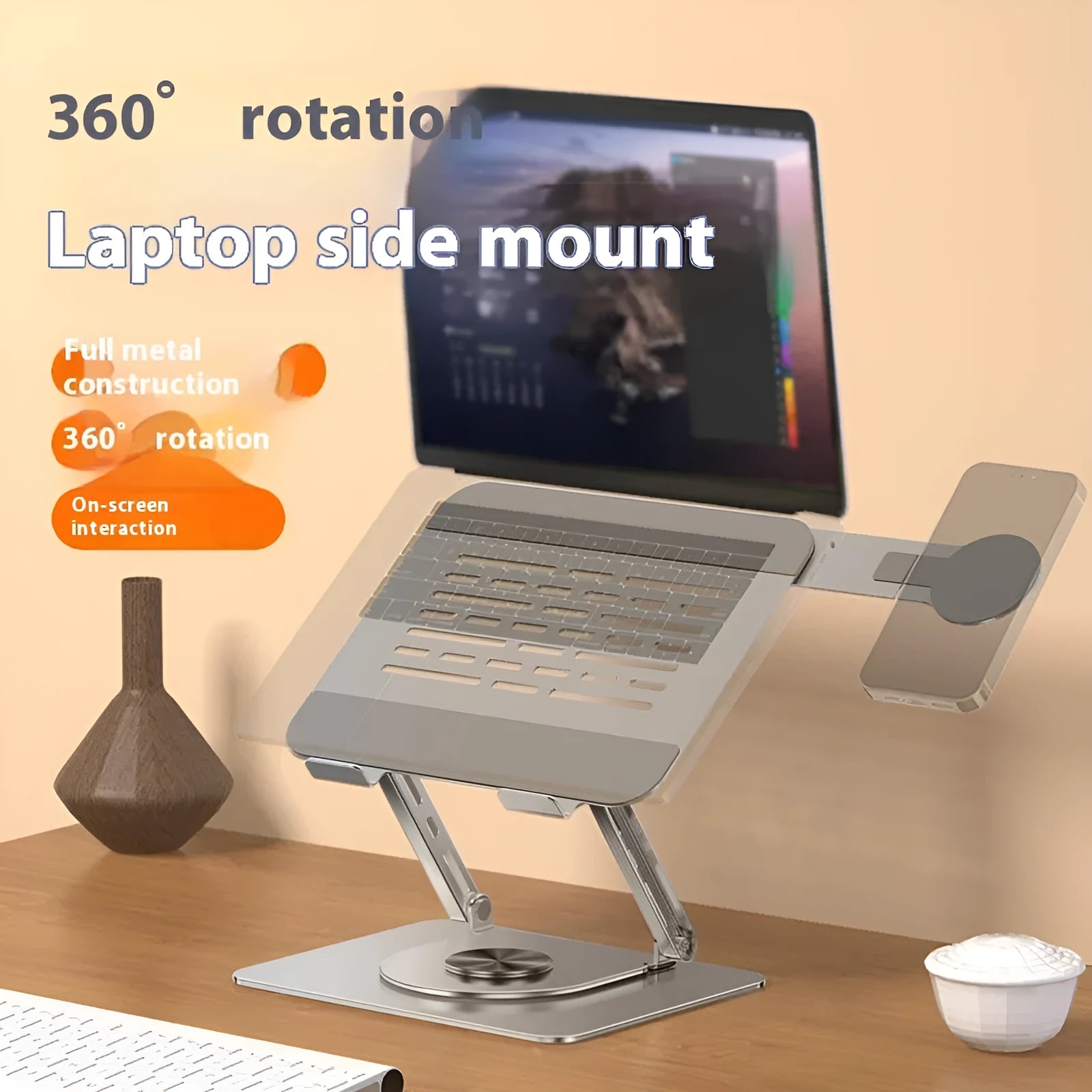 Silver carbon steel laptop stand with side-mounted magnetic phone holder rotated at angle