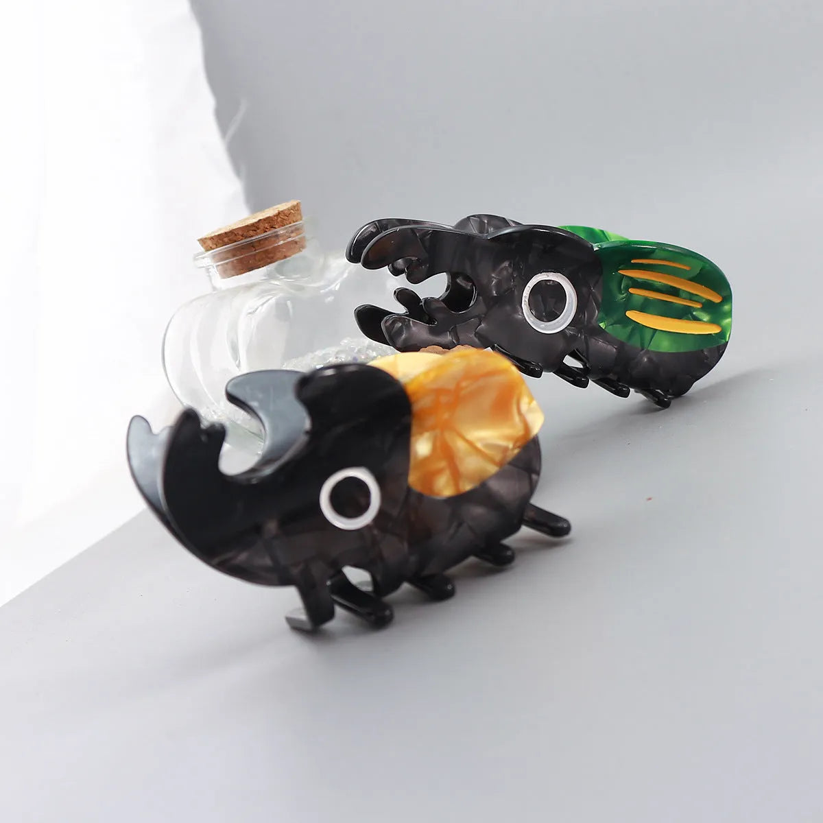 Handmade cellulose acetate insect biology beetle grip with cartoon beetle and caterpillar designs