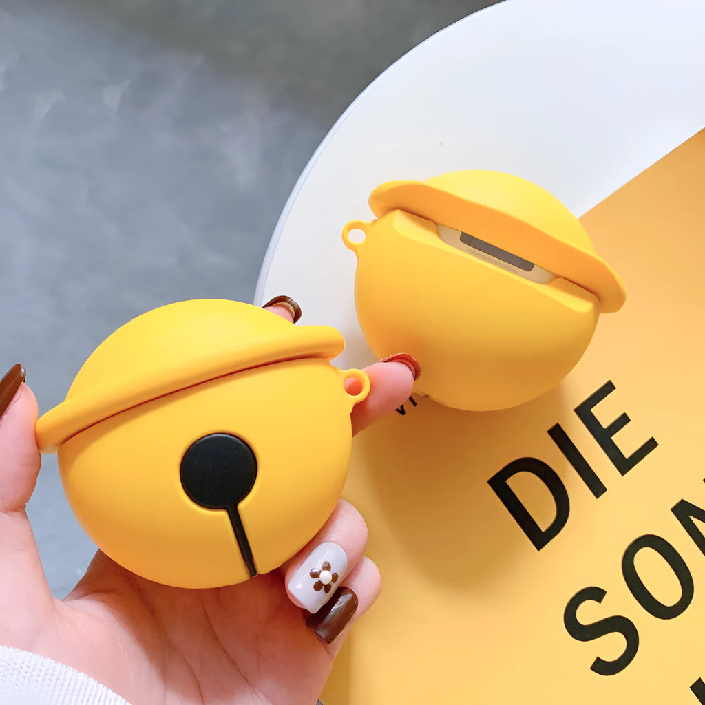 Bright yellow silicone case for AirPods 1 and 2 with a small silver bell charm attached.