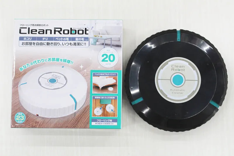 Black or pure white automatic floor sweeping robot with 23cm diameter on wooden floor