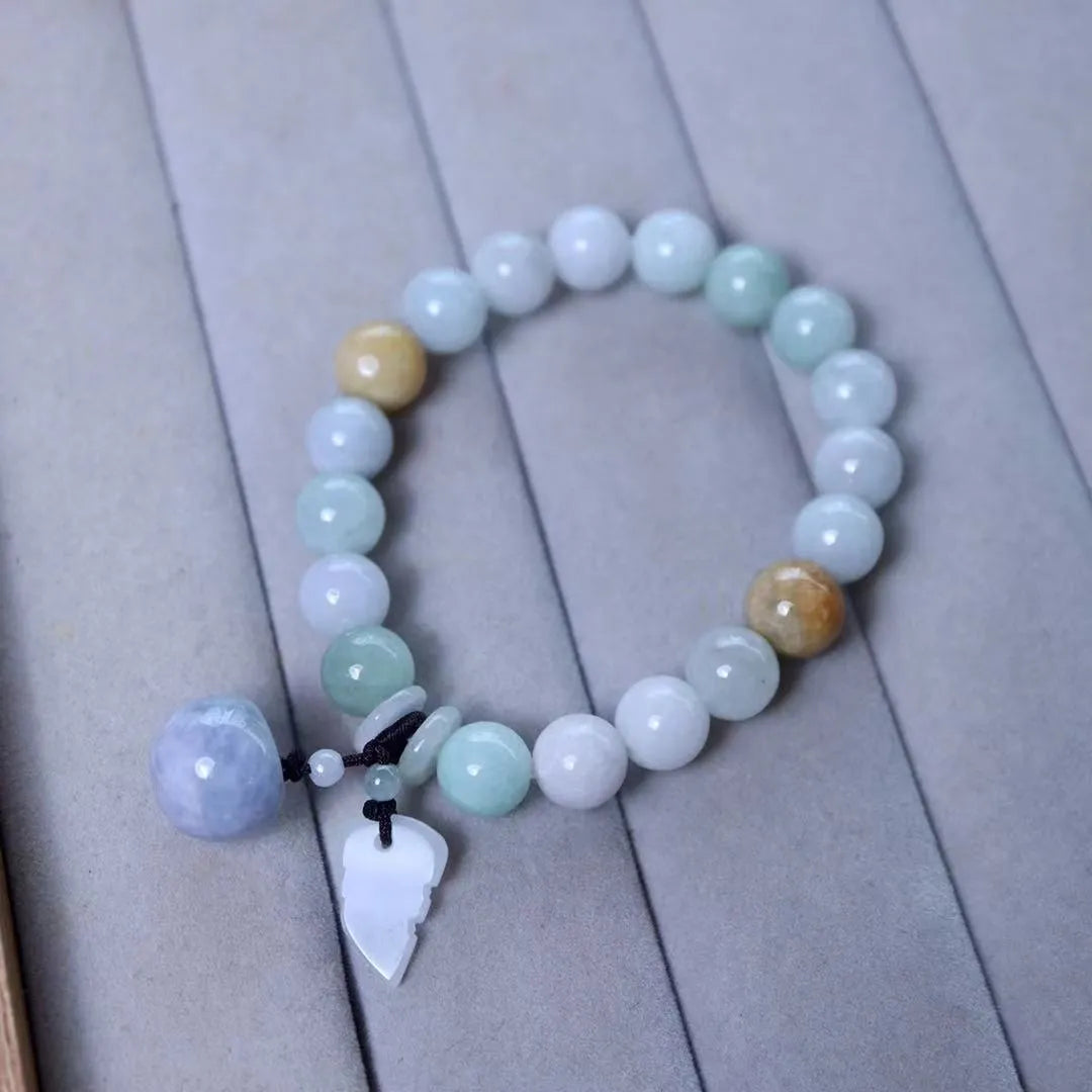 Natural jade bracelet with geometric hanging design and Buddhist elements including Maitreya Buddha motif