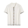 White women's cardigan with dark contrast lapels and short sleeves laid flat