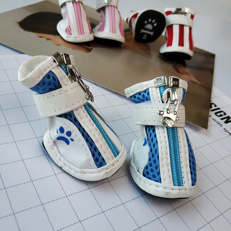 Blue zipper closure cloth dog shoes with non-slip soles for small breeds.