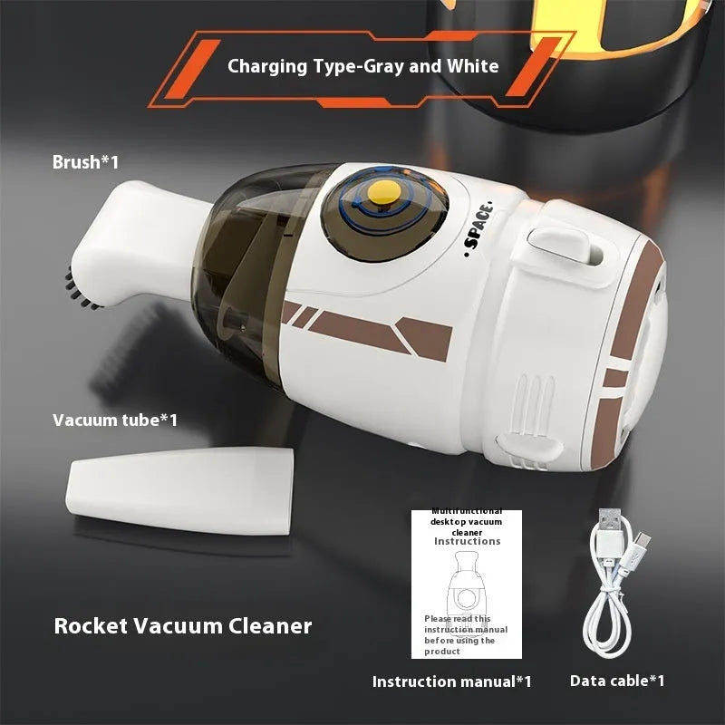 USB handheld desktop vacuum cleaner in blue rocket design on a wooden desk