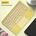 Square hat touch wireless Bluetooth keyboard in assorted colours on a desk.