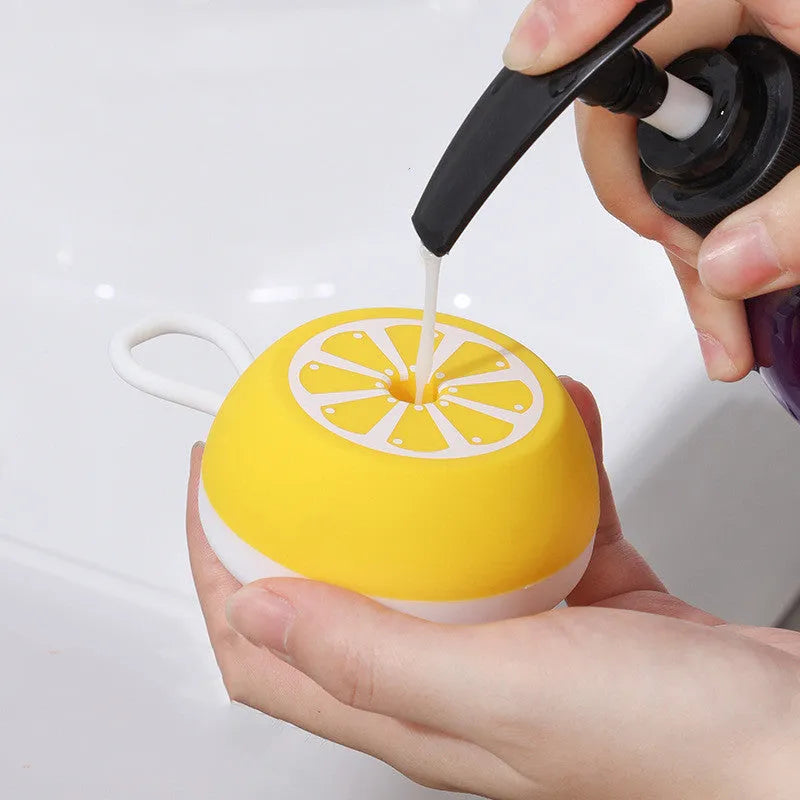 Yellow silicone pet bath brush with massage head and comb functions for dog grooming