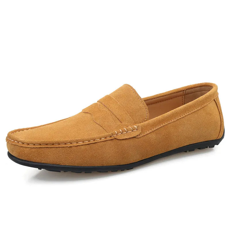 Men's solid colour suede leather slip-on loafers with a flat rubber sole.