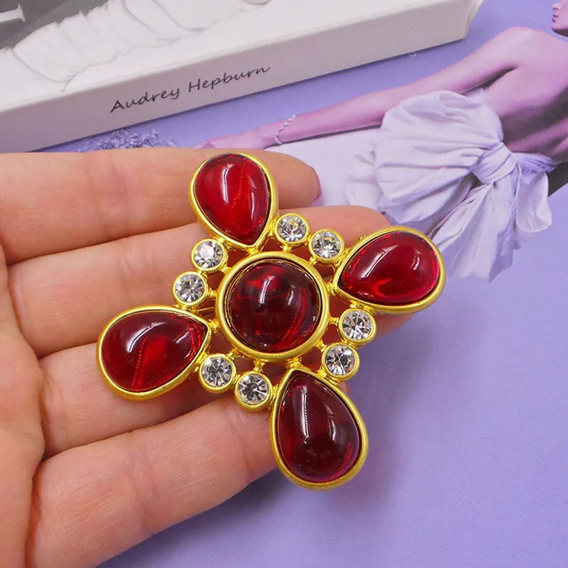 Close-up of a vintage zinc alloy baroque cross brooch with crystals, showing one of eight available colour styles.