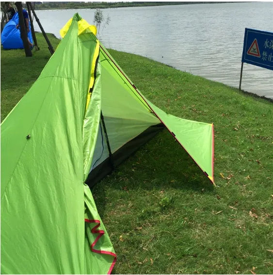 Poleless gold-shaped double layer camping tent in green on grass, 270x160x130cm