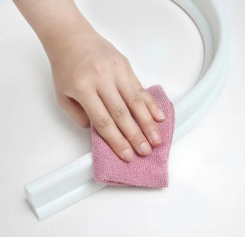 Flexible TPE bathroom water blocking strip in black, grey, or white.