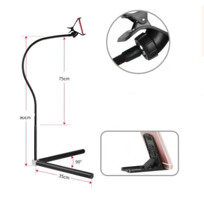 Black bedside mobile phone bracket with adjustable overhead shelf mounted beside bed frame