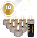 Four taupe-coloured LED tealight candles with realistic 3D flame effect on wooden surface