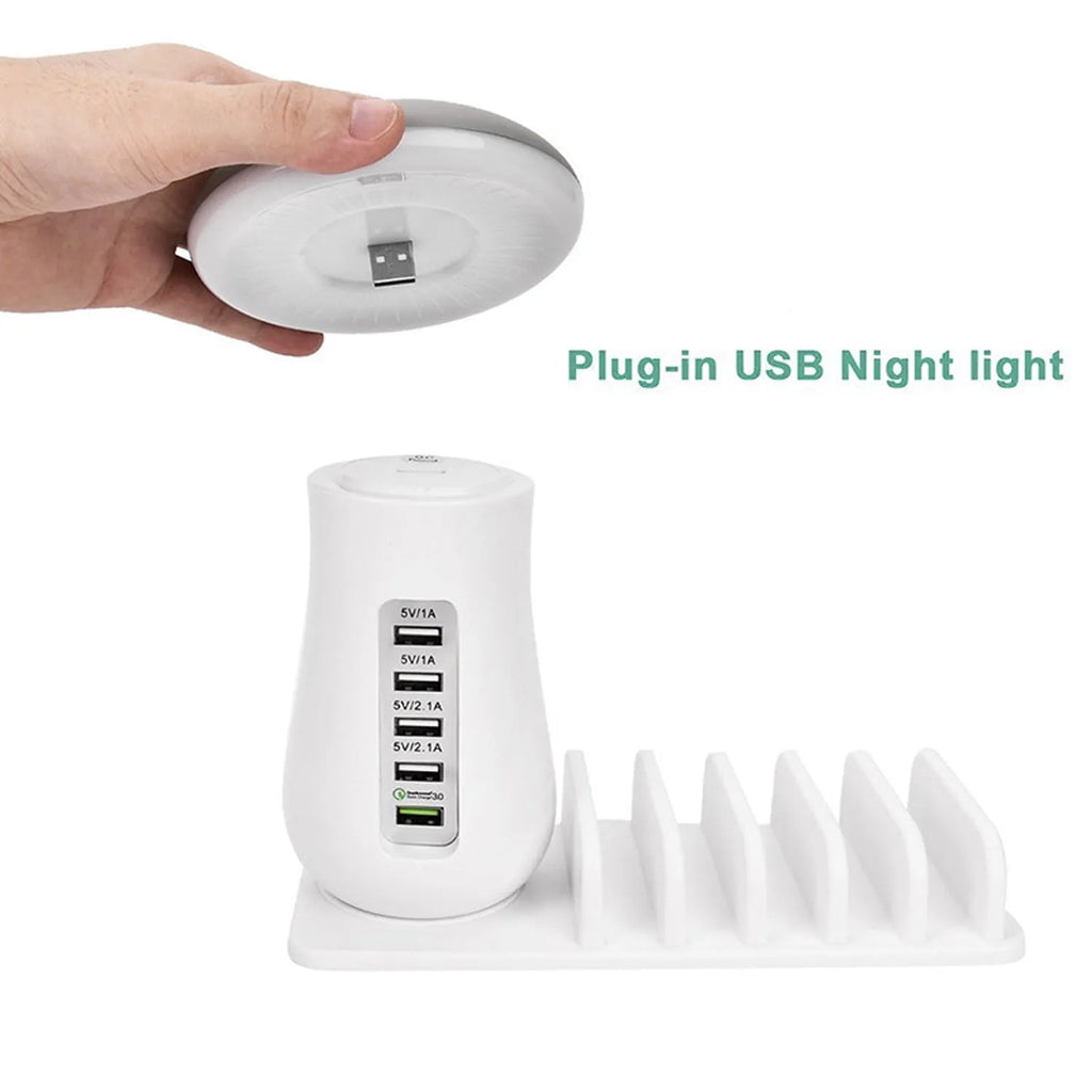 White 5-port USB charging dock station with integrated mushroom-shaped LED night light on a desk