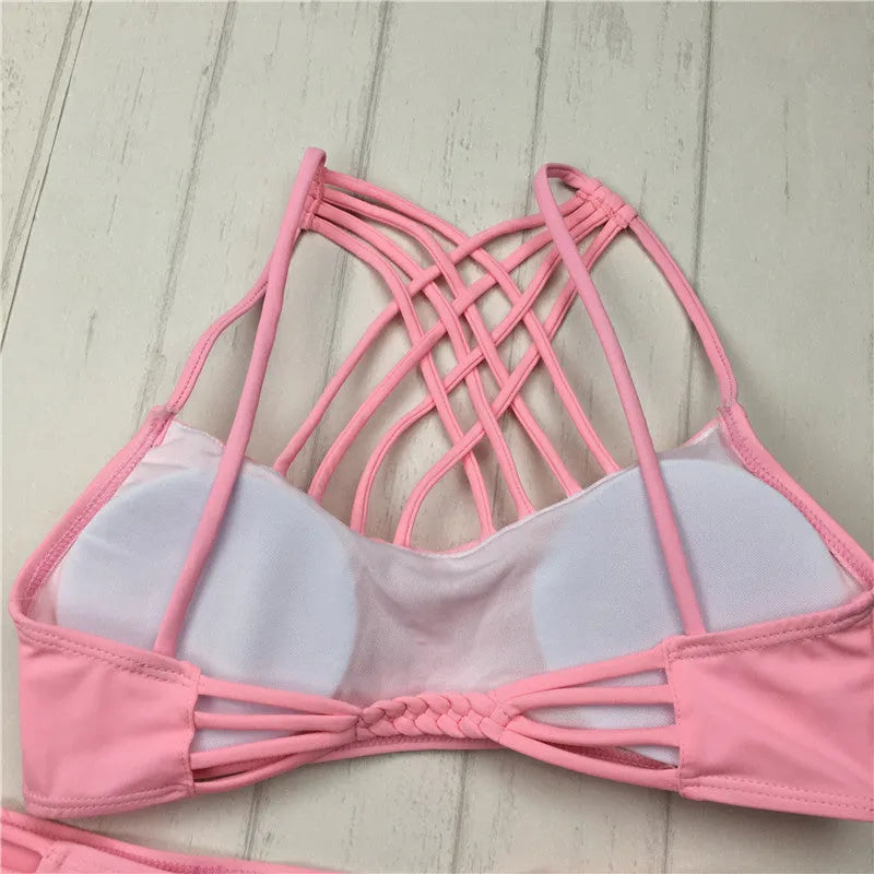 Women's pink bandage halter bikini swimsuit with cut out cross front design