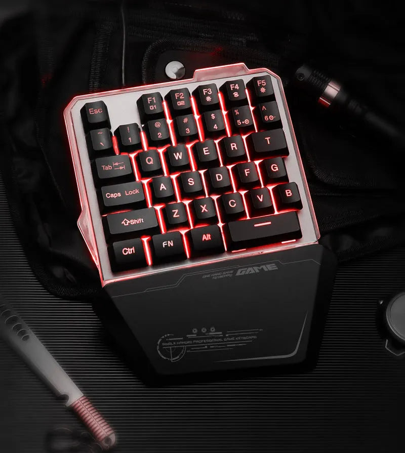 Black robotic one-handed keyboard with RGB backlighting and mechanical switches