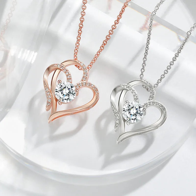Women's heart-shaped pendant necklace in 925 silver with choice of platinum, gold, or rose gold finish.