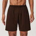 Men's quick-dry double-layer running shorts in various colours on a neutral background.