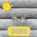 Oval denier ring with five-pointed star ornamentation and 6x8 mm main stone