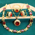 18k gold plated zircon jewellery set showing necklace, earrings, ring, and bracelet with synthetic cubic zirconia stones