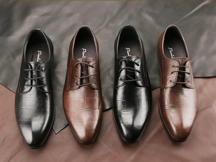 Men's black cow leather Derby shoes with pointed toe and rubber sole on a plain background