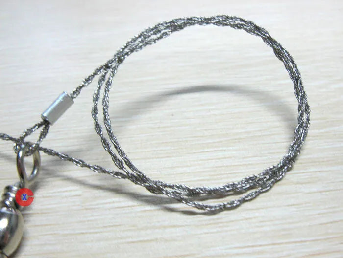 70cm stainless steel survival wire saw with thumb rings showing 600mm cutting blade