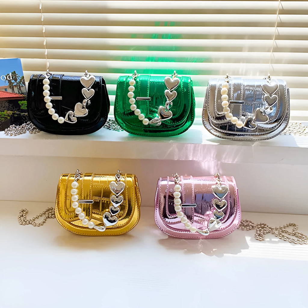 Horizontal square mini saddle bag in PU leather with sandwich pocket detail and adjustable shoulder strap