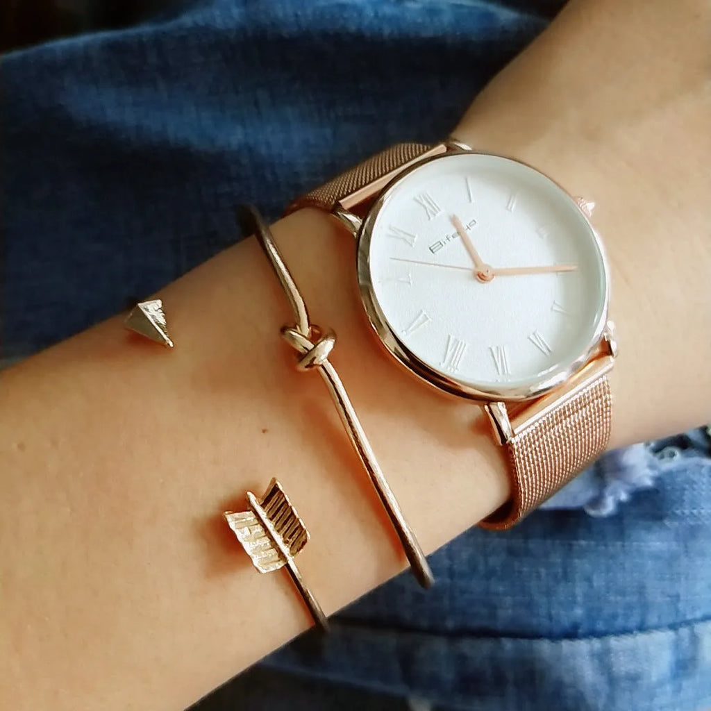 Gold electroplated alloy cuff bracelet with arrow and knot vintage design for women