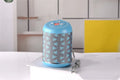 Portable outdoor Bluetooth subwoofer in black with button controls for radio, calls, and playback modes