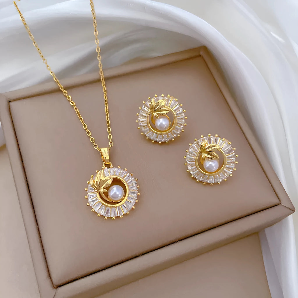Titanium steel square diamond leaves necklace and matching stud earrings set with copper pendant and gold plating.