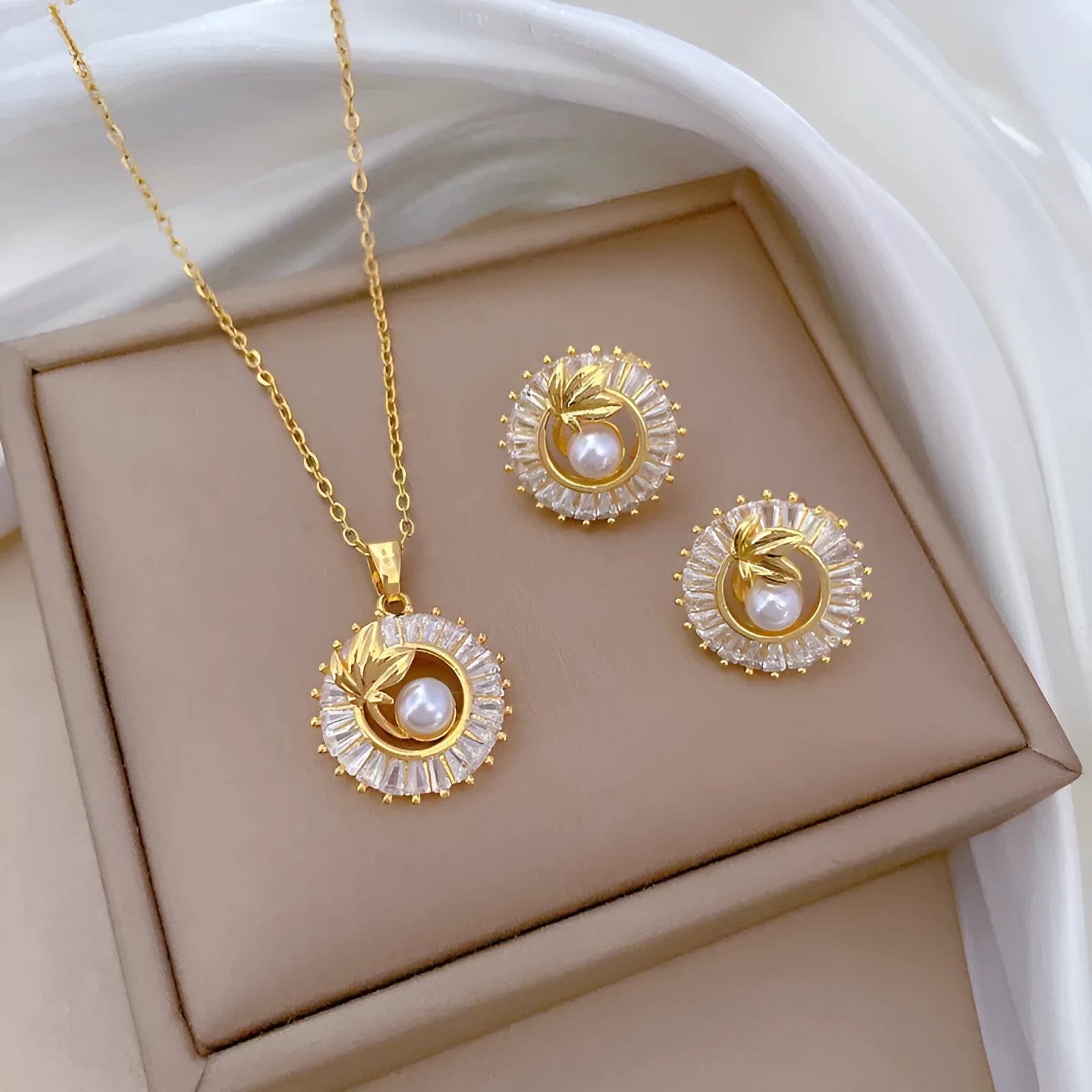 Titanium steel square diamond leaves necklace and matching stud earrings set with copper pendant and gold plating.
