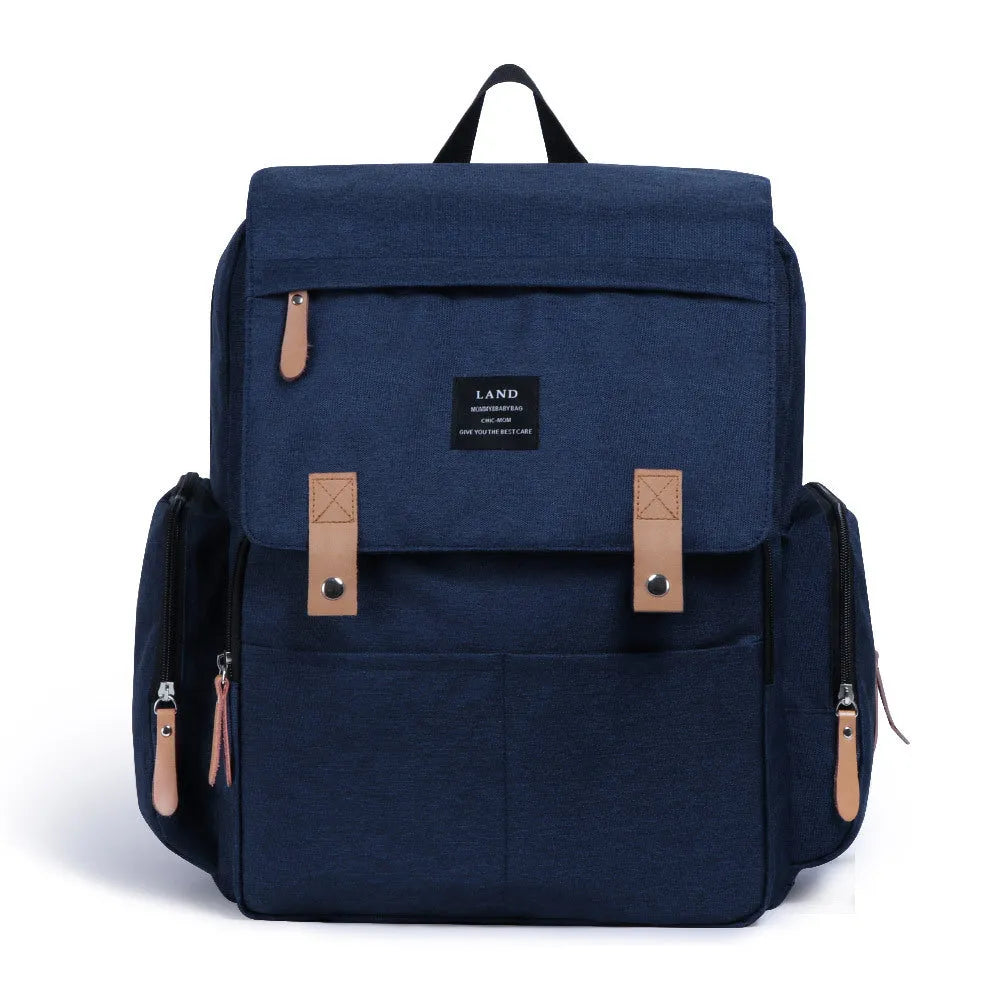 LAND Mommy Diaper Bag Backpack in oxford cloth with changing mat, shown in beige colour.