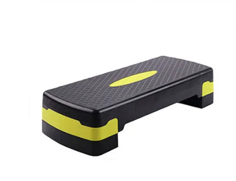 Grey ABS plastic aerobic step platform measuring 68x28x15cm for home fitness and yoga exercises.