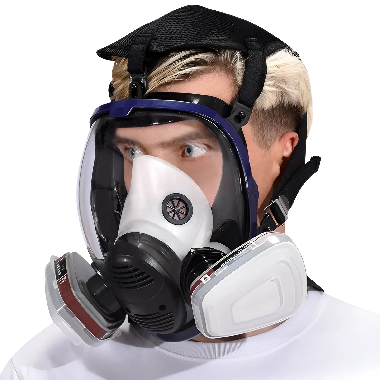 Gas mask with activated carbon canister and spherical silicone facepiece showing trapezoidal filter design