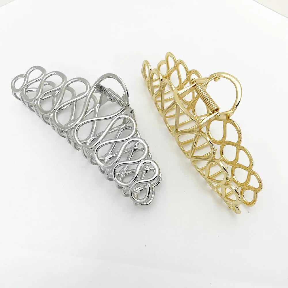 Minimalist large alloy hair clip with electroplated gold or silver finish and tassel detailing for thick hair