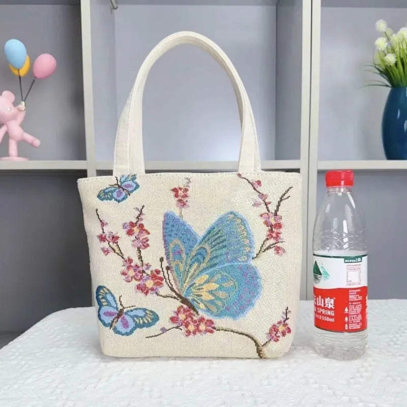 Double-sided gold wire embroidered canvas tote bag in small, medium, and large sizes with floral patterns.