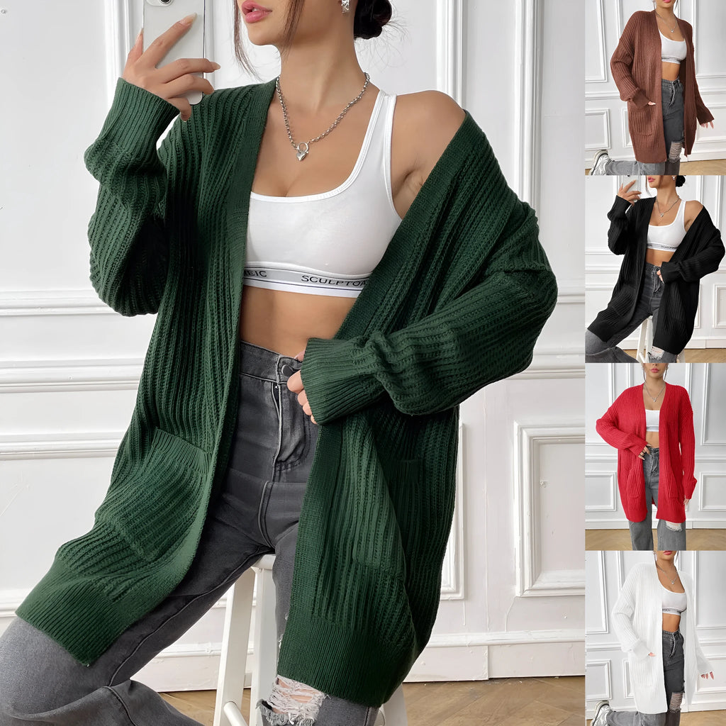 Women's dark green two-pocket acrylic cardigan sweater with loose fit and long sleeves