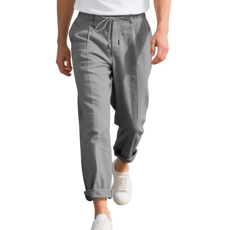 Men's casual linen trousers in light khaki colour with drawstring waist and straight leg