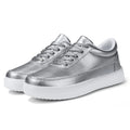 Women's white leather casual flat lace-up shoes on a light background, showing the front and side profile.