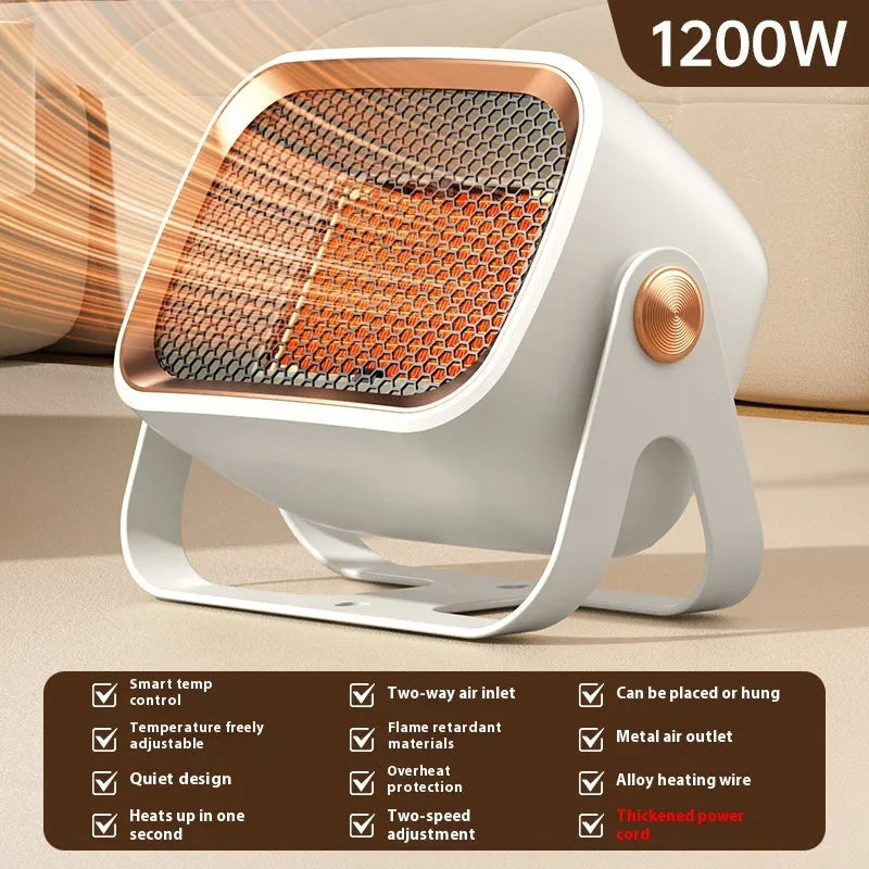 Compact white desktop electric heater with rotatable grill on a wooden table.