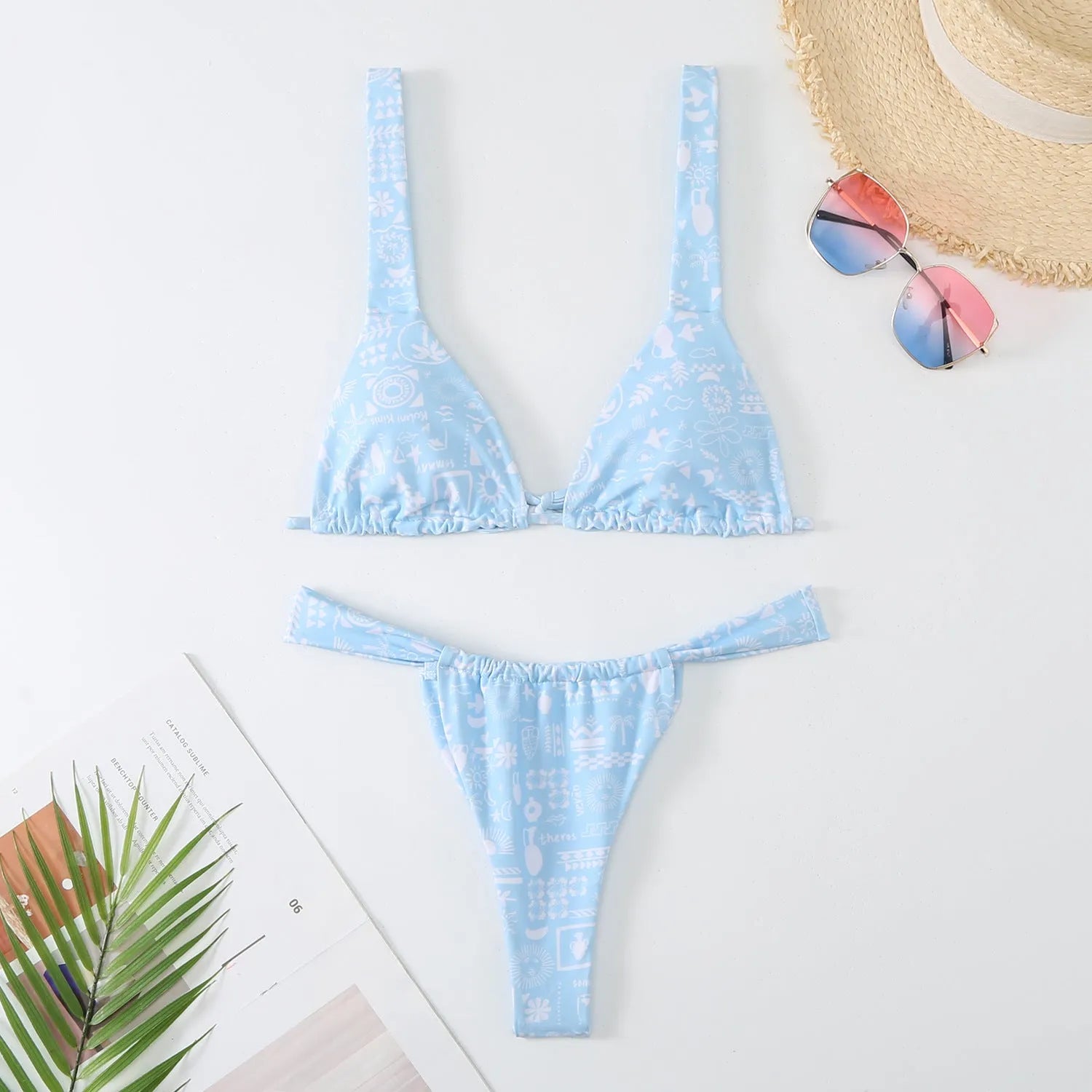 Women's floral print bikini swimsuit in briefs style with multi-colour patterns and polyester fabric construction