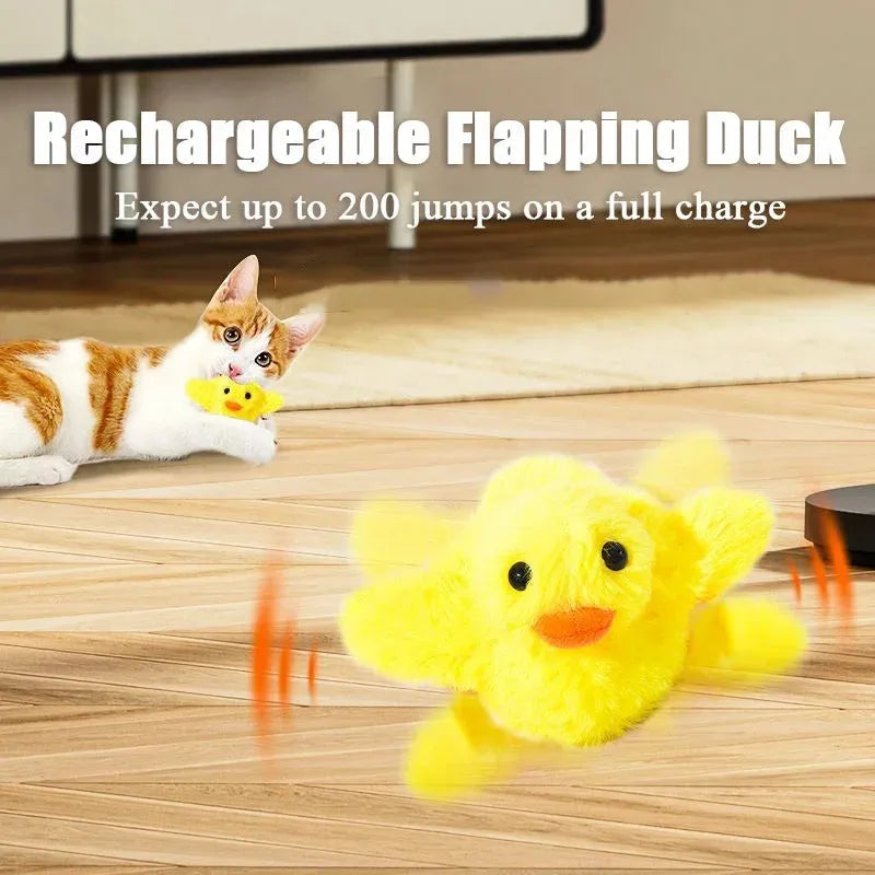 Yellow chick-shaped interactive cat toy with flapping wings and USB charging cable
