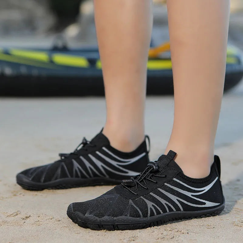 Low-top casual sports running shoe in colour option, showing front lace-up and textured natural rubber outsole.