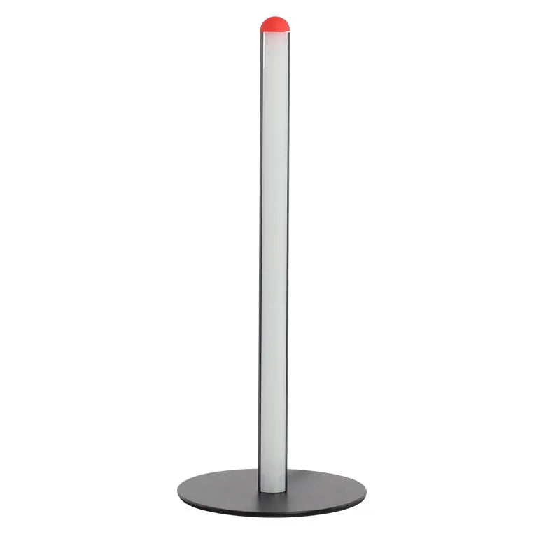 Vertical aluminium alloy floor lamp in modern simple style next to a sofa.