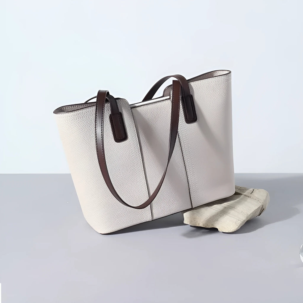 Genuine leather women's large shoulder bag in box-type design with sandwich pocket.