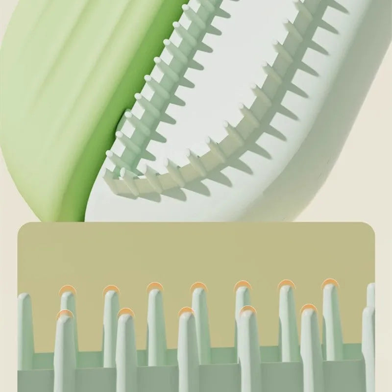 Blue pet grooming comb with built-in water tank for dogs and cats.