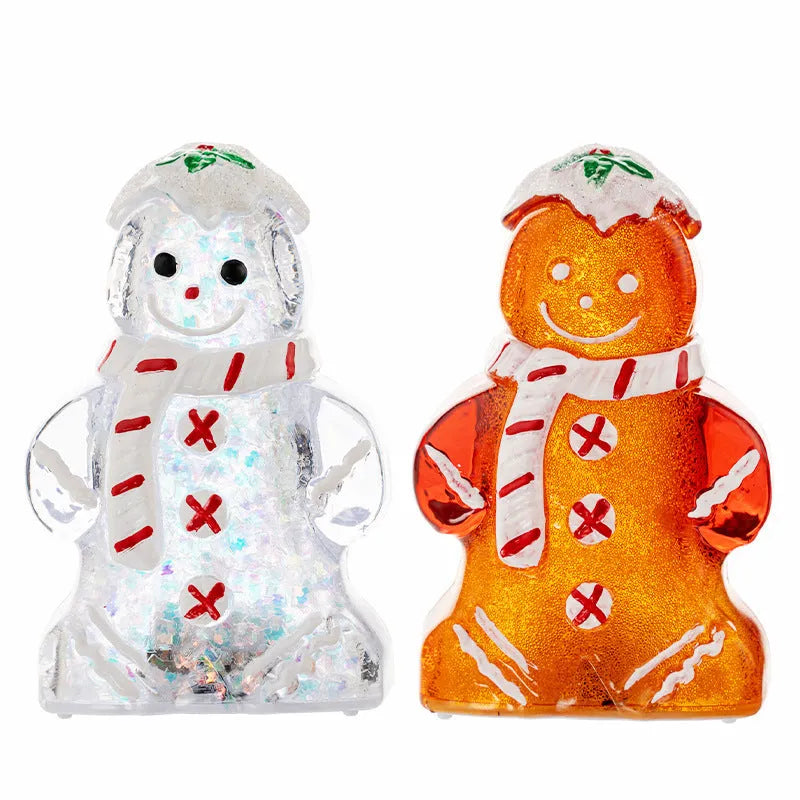 Set of four glowing Christmas gingerbread man and snowman ornaments with different coloured scarves on a festive background.
